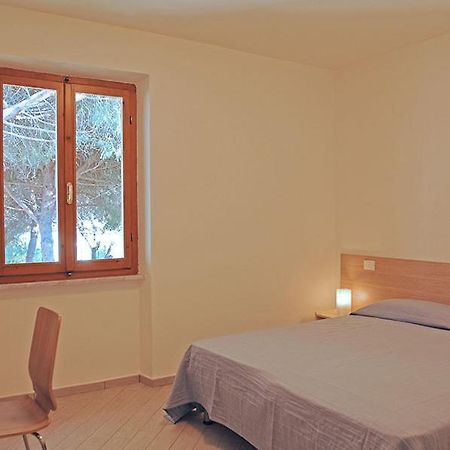 Appartamenti Casa Pineta Марина ди Кампо Стая снимка