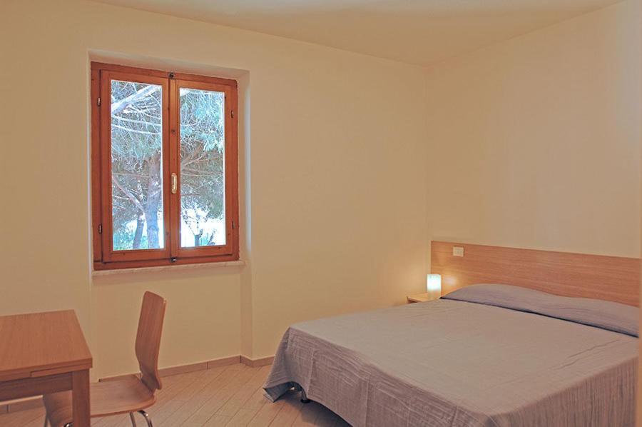 Appartamenti Casa Pineta Марина ди Кампо Стая снимка